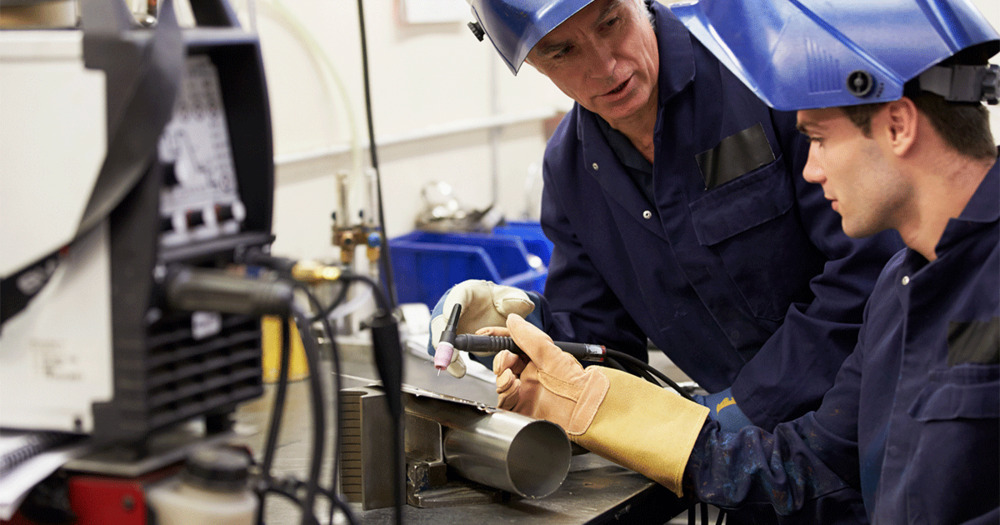 Two workers wearing ppe