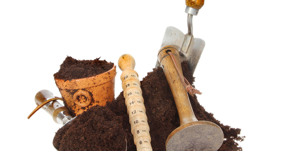 measuring tools and garden shovel