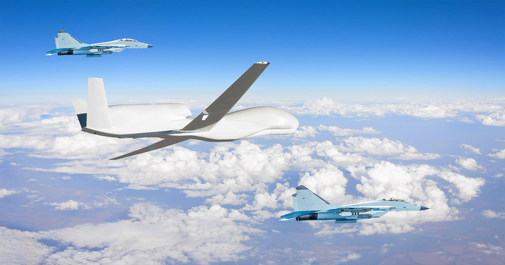 unmanned-drone-and-fighter-jets