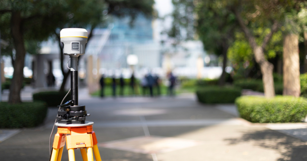 A GPS receiver being used in a city area for land surveying.