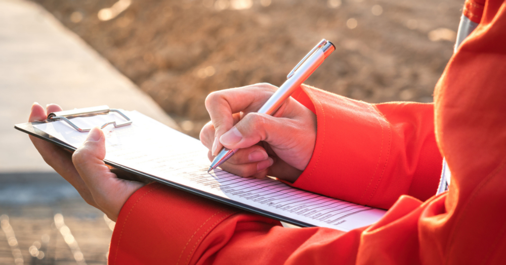 A lone worker going through a remote worksite safety checklist.